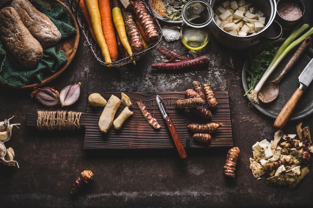 Similar – Image, Stock Photo Two women’s hands clean large carrots for slicing