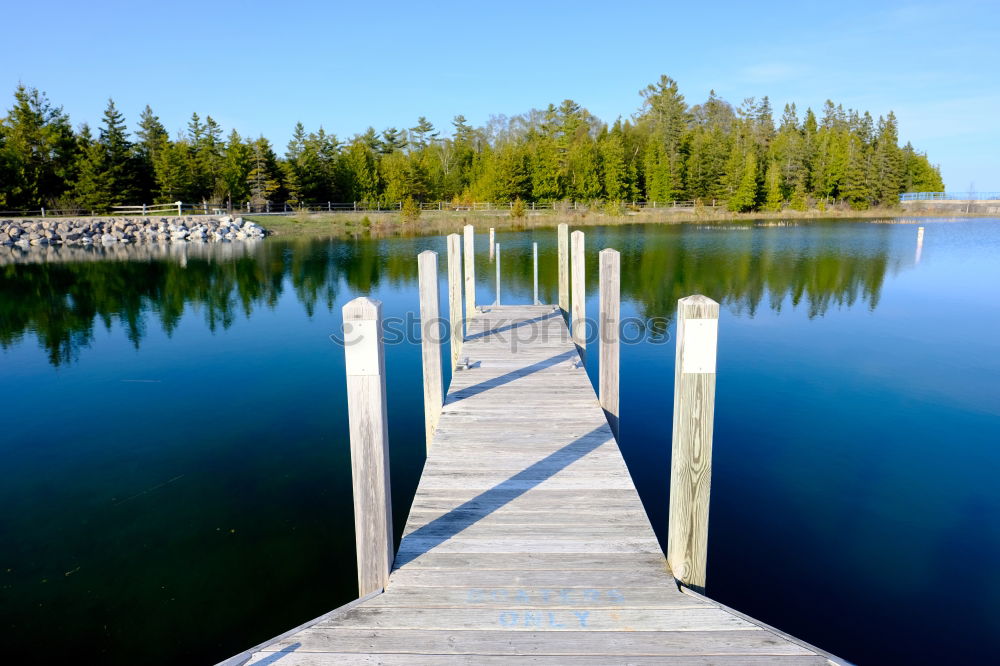 Similar – Image, Stock Photo Wooden bridge on the sea coast