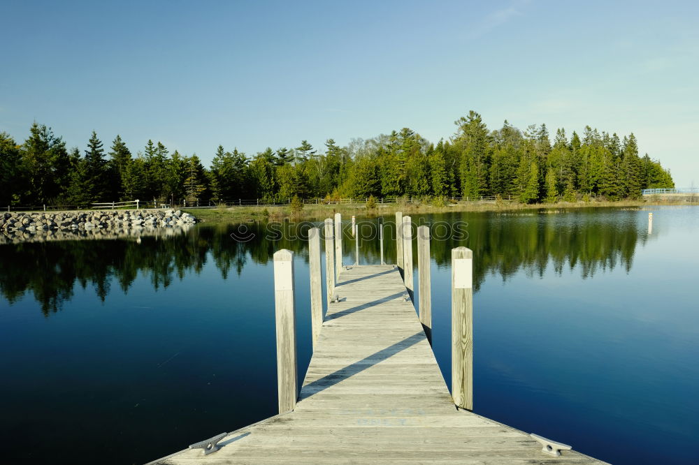 Similar – Image, Stock Photo Wooden bridge on the sea coast