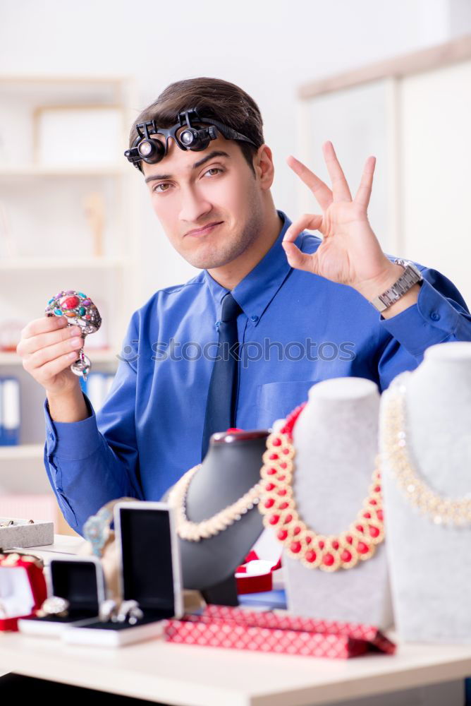 Similar – Image, Stock Photo Woman in work wear in her workshop by table with handmade items