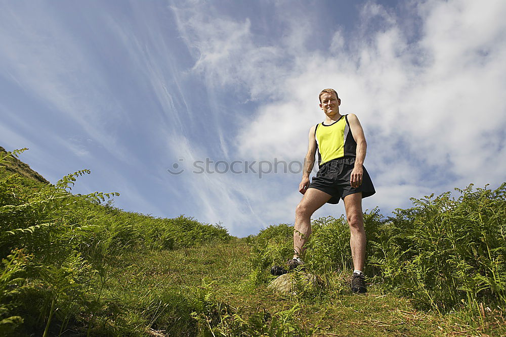 Similar – Image, Stock Photo Fit muscular man jogging on a rural trail