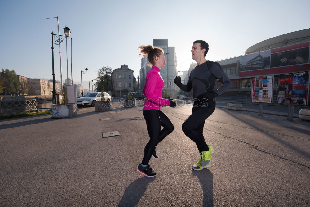 Similar – Image, Stock Photo Young couple exercising at the waterfront