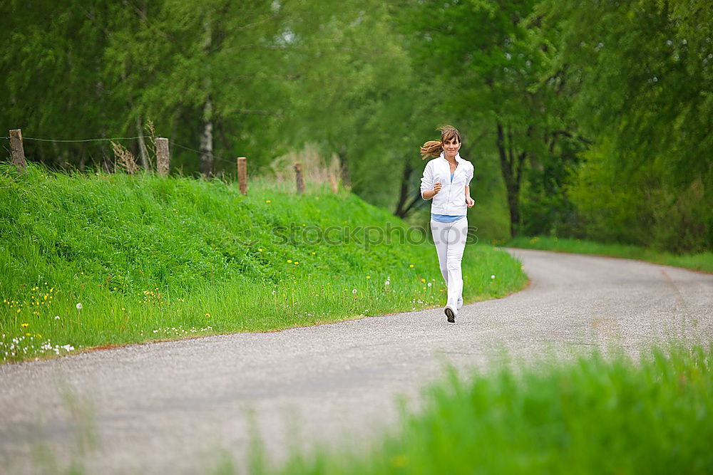 Similar – young woman jogging