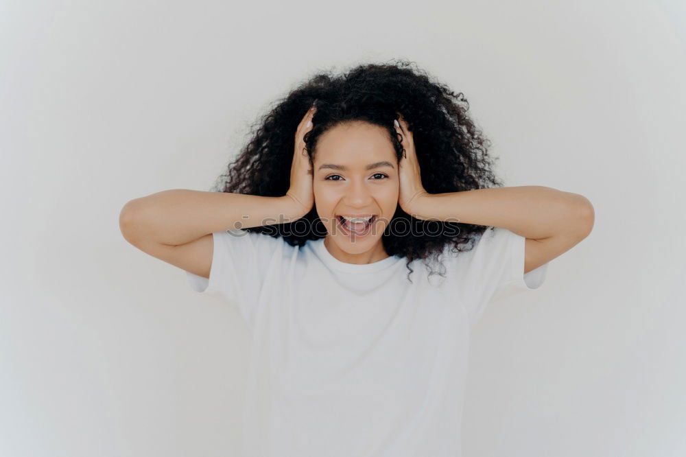 Similar – Ethnic woman making faces