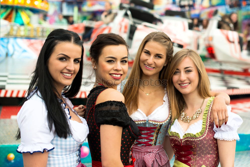 Similar – Foto Bild Freundinnen in traditioneller bayerischer Kleidung Dirndl oder Tracht mit Schenk mir dein Herz, Du bist die beste auf Lebkuchenherz auf dem Oktoberfest geschrieben