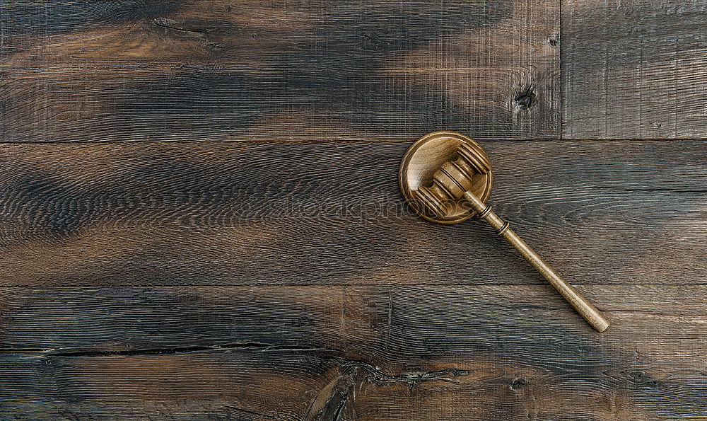 Similar – Black cast-iron frying pan on a brown wooden surface