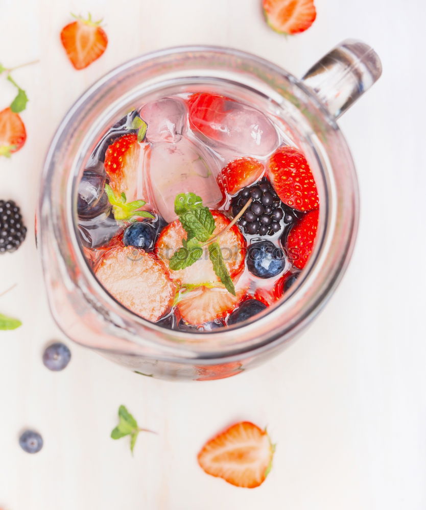 Similar – Image, Stock Photo Ice cubes and berries in bowl on the garden table