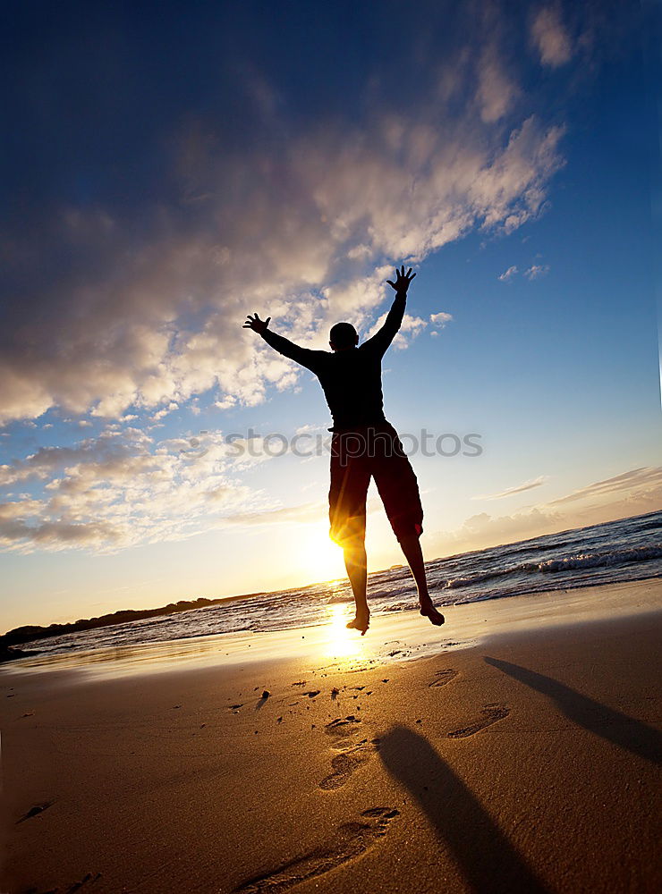 Similar – Image, Stock Photo Father and son playing on the beach at the sunset time. People having fun outdoors. Concept of happy vacation and friendly family.