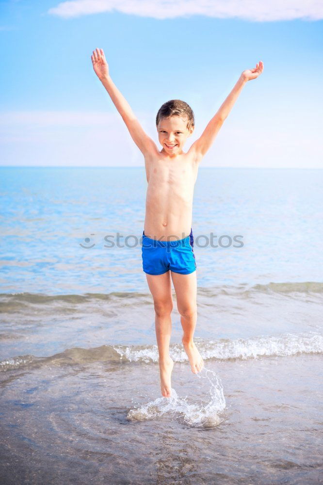 Similar – Playful girl standing in pier near lake