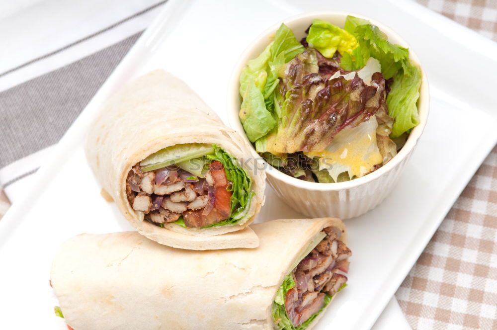 Similar – Image, Stock Photo Mediterranean goat cheese baked in parchment paper