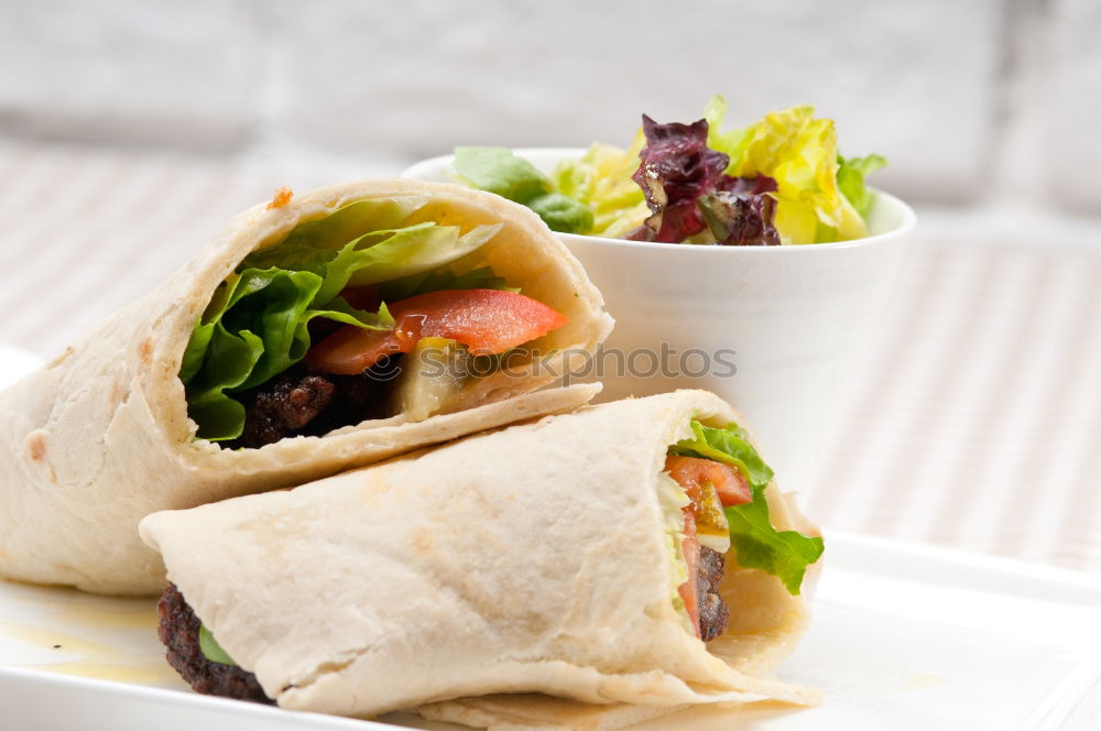 Similar – Image, Stock Photo Mediterranean goat cheese baked in parchment paper