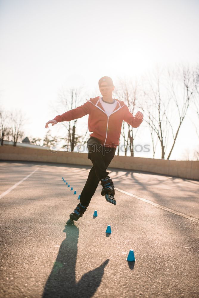 Woman jumping barefoot over blue rubber hills