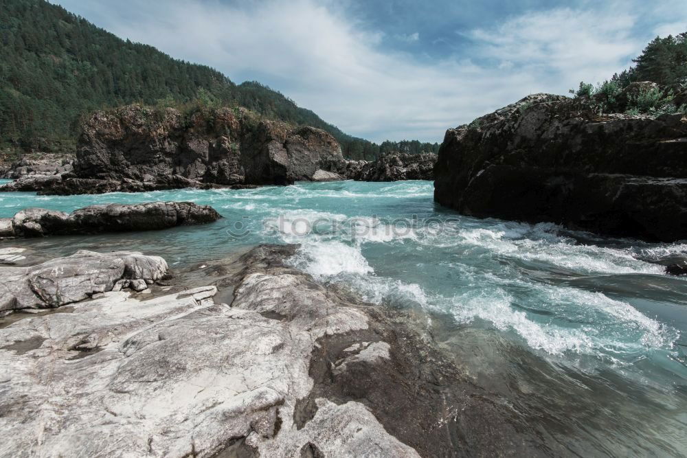 Similar – Image, Stock Photo Water flowing calmly in mountain valley