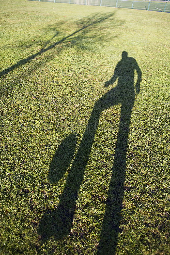 Similar – shadow man Green Meadow