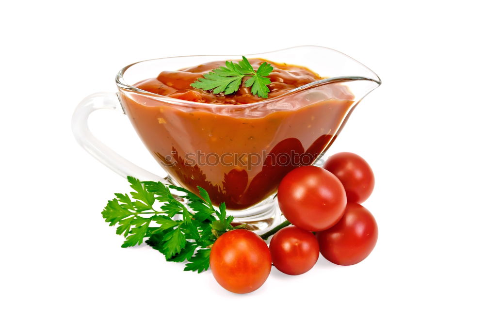 Similar – Fresh tomato soup with ingredients