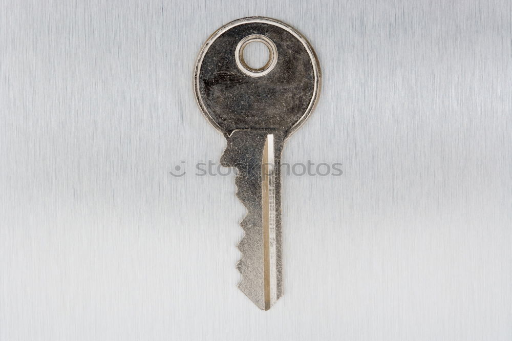 Similar – Image, Stock Photo Old rusty key with a paper label on the wooden board