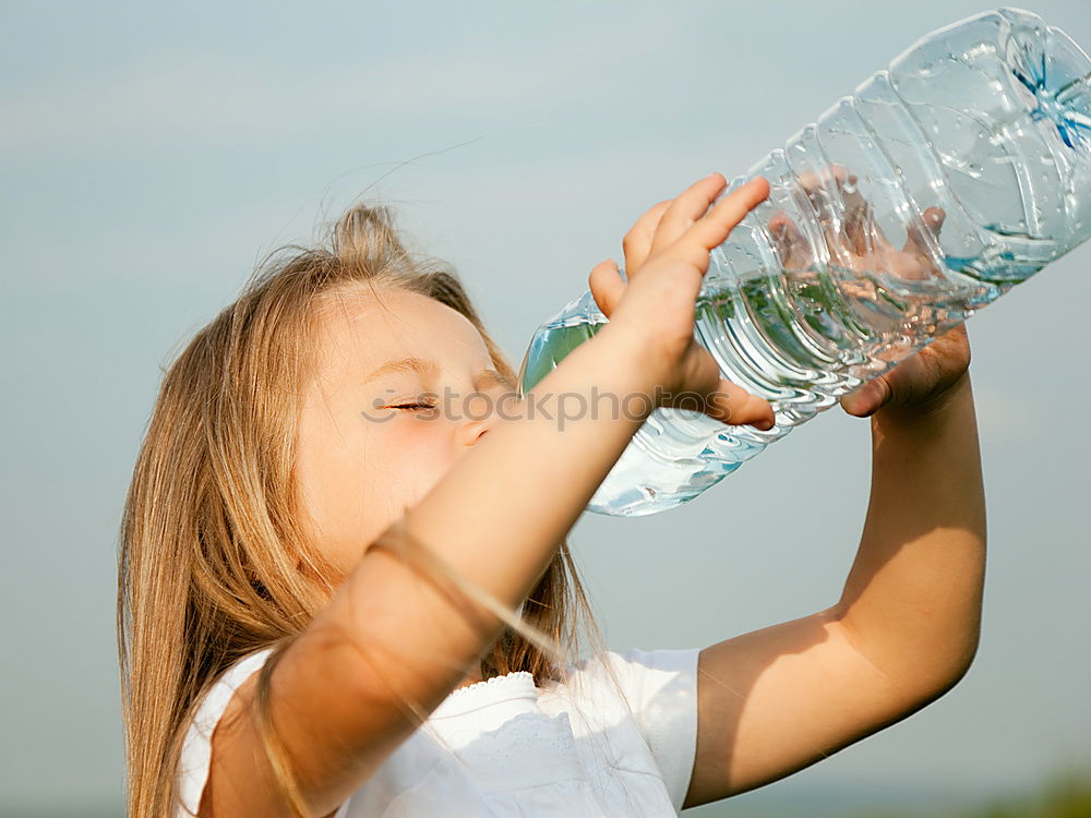 Similar – adorable boy watering the plants