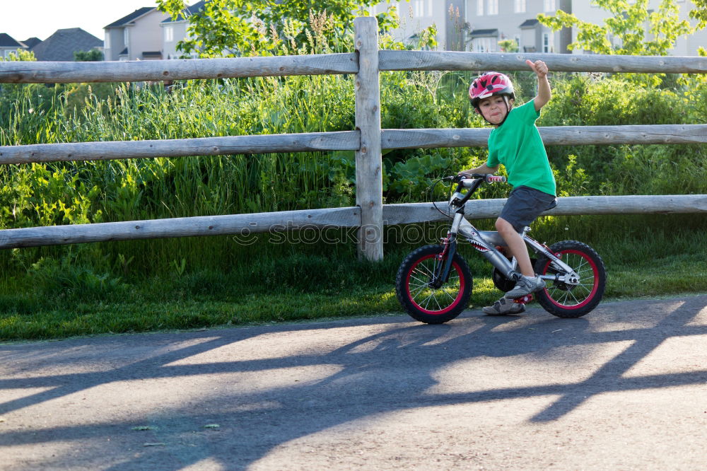 Similar – Junge fährt mit dem Fahrrad zur Rampe