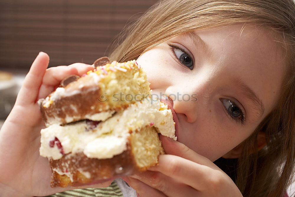 Similar – Image, Stock Photo Female hands tying baked Christmas gingerbread with ribbon