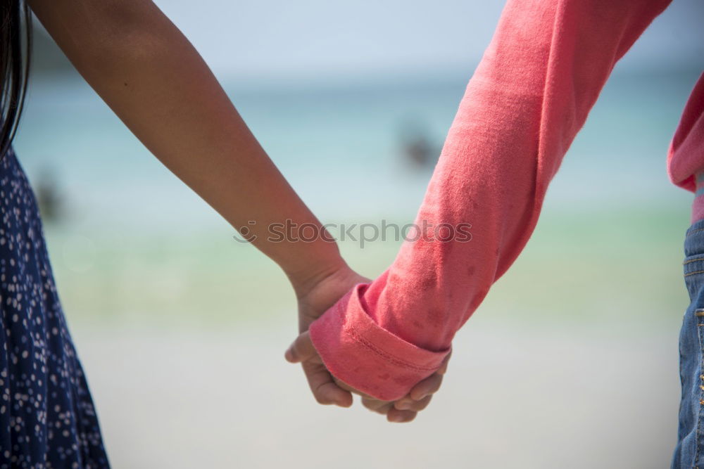 Similar – Two young women in walking holding her hands