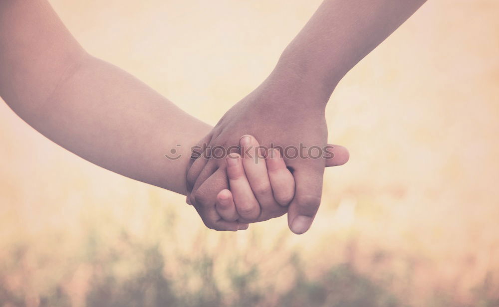 Similar – Two young women in walking holding her hands