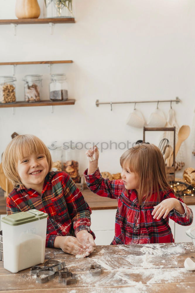 Similar – Boy in cook hat in kitchen