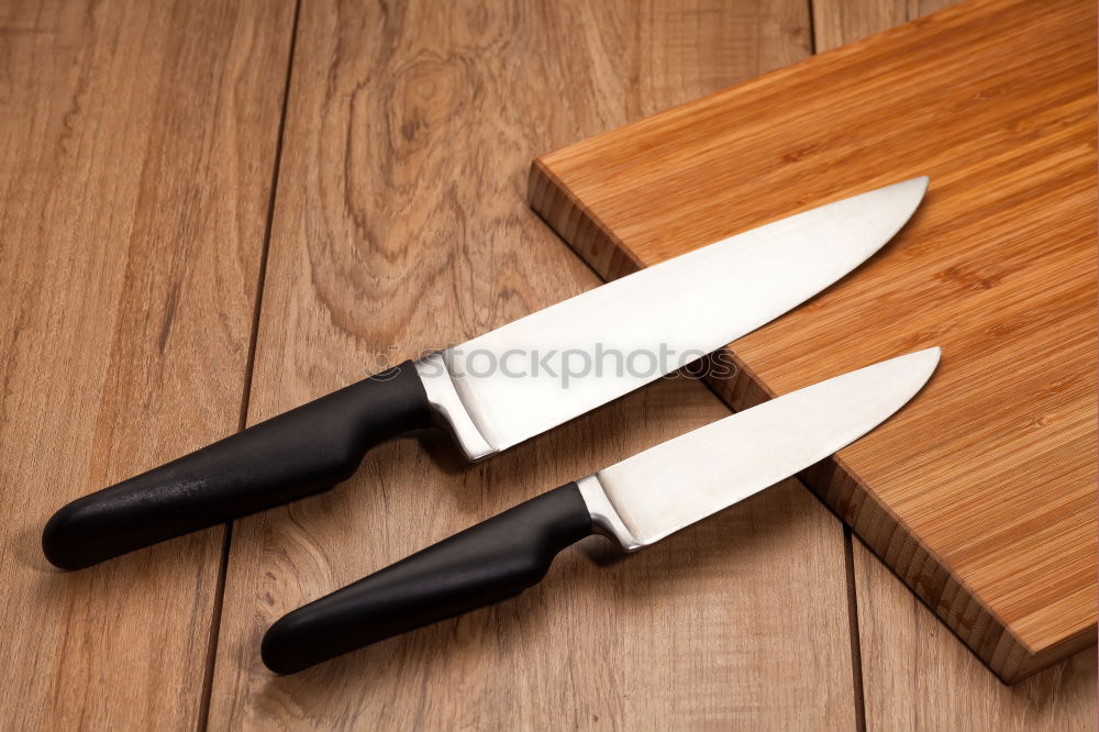 Similar – broken knife on cutting board