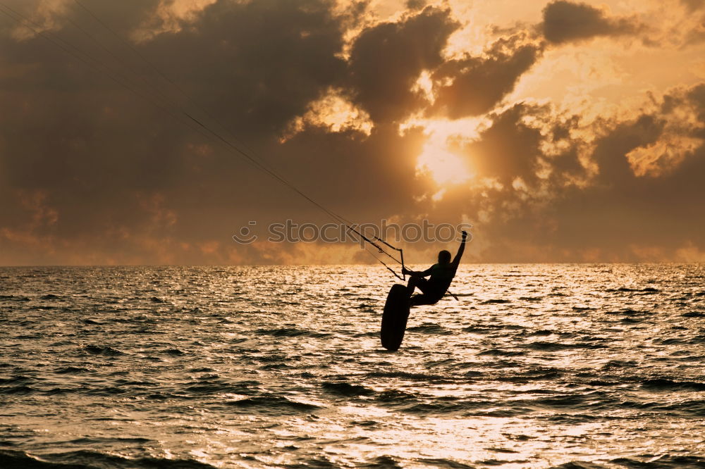 Similar – Surfers at sunset in Mauritius