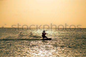 Similar – Image, Stock Photo Father and son playing on the beach at the sunset time.