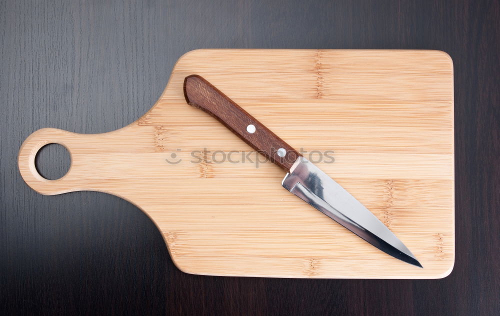 Similar – wooden cutting board and old knife