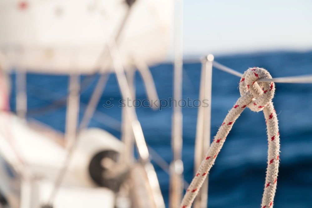 Similar – Fenders suspended between a boat and dockside for protection. Maritime fenders