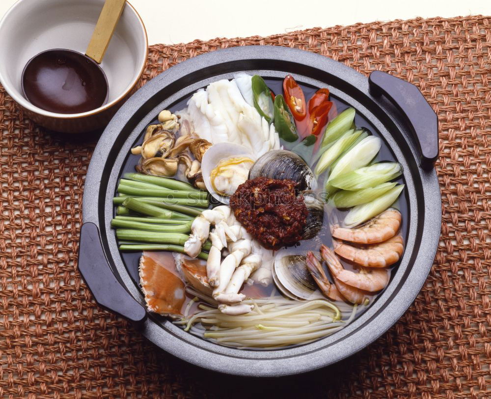 Similar – Geometric bowl of Asian Noodle Soup with chopsticks