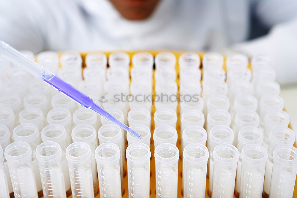 Similar – Tubes in holders in lab