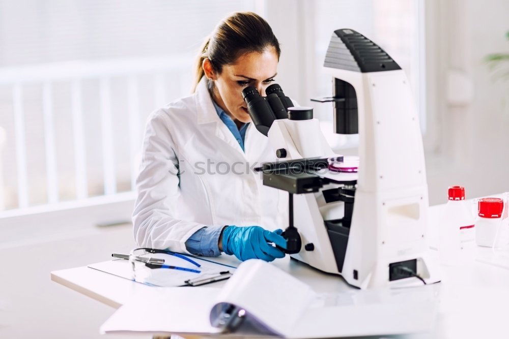 Similar – Image, Stock Photo Woman working with microscope