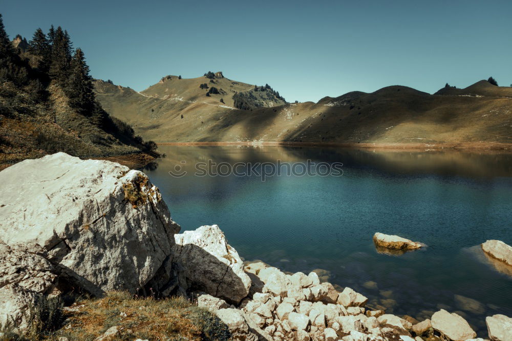 Similar – Lonely lake in Norway in the mountains