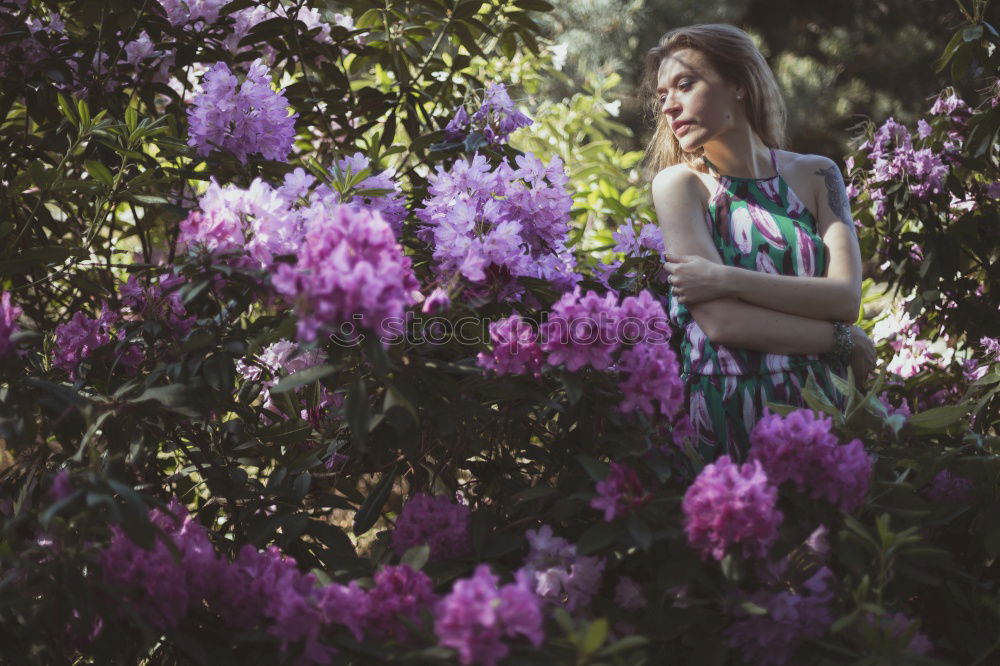 Similar – Image, Stock Photo Crop woman touching yellow flower