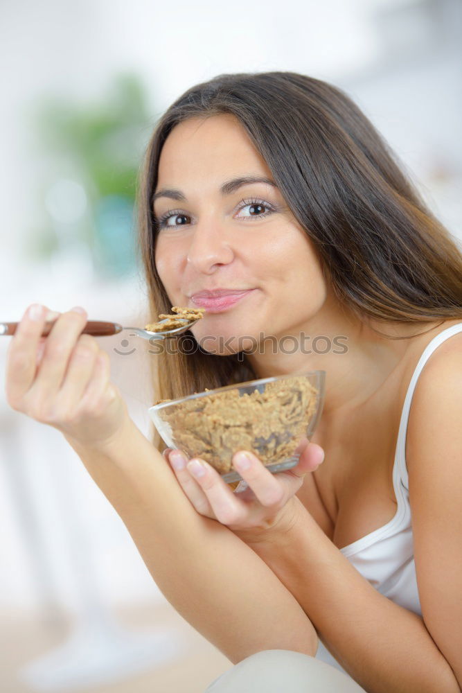 Similar – Image, Stock Photo woman close up eating oat and fruits bowl for breakfast