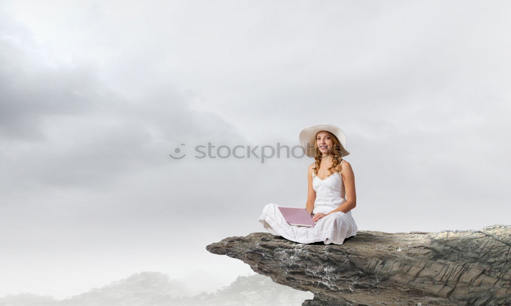 Man relaxing on cliff