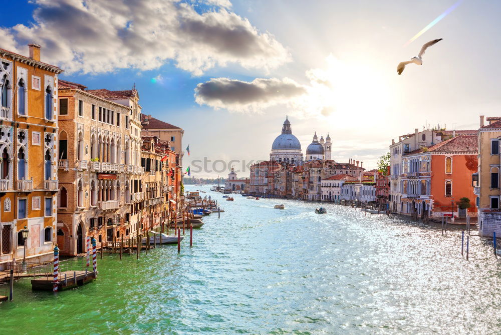 Similar – Urban landscape of Venice, water canals with boats.