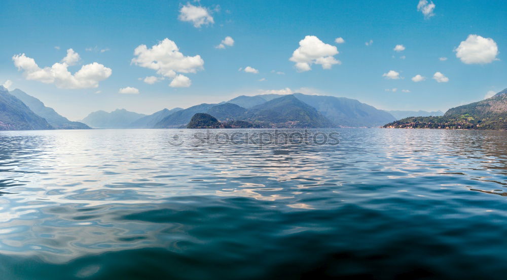 Similar – Image, Stock Photo Mountain landscape with a lot of kite surfers and windsurfers moving in a lake. They use the wind to move their boards on the water. Mountains are as background in a sunny day.