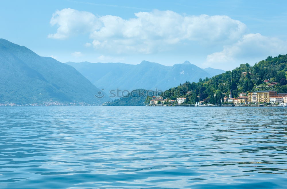 Similar – Image, Stock Photo Summer on Lake Maggiore with a man who takes pictures