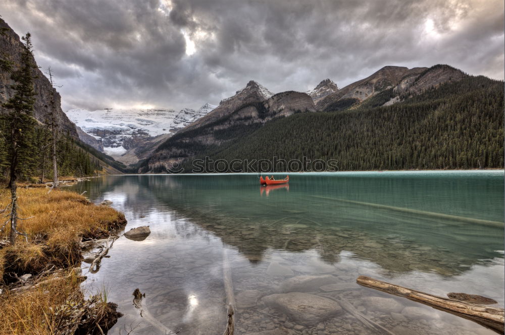 Similar – Wooden dock on lake in mountains