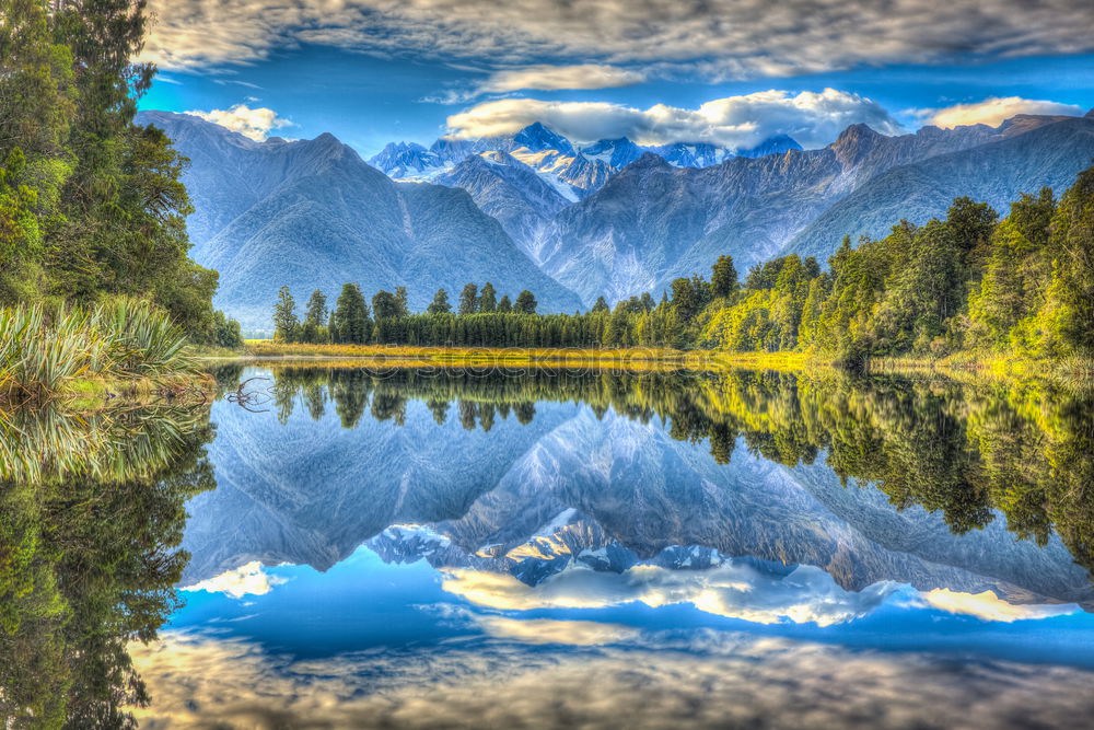 Similar – reflections in lake seebensee