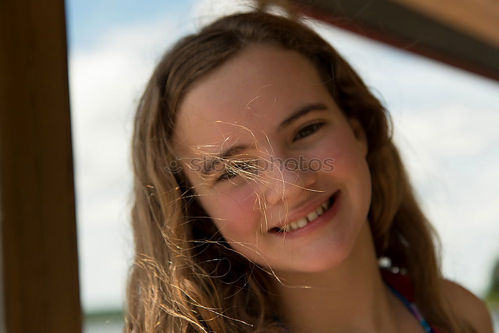 Similar – Image, Stock Photo Young woman with dreadlocks laughs into the camera