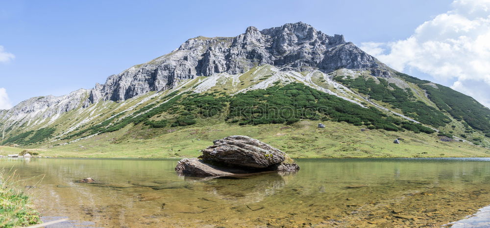 Similar – Image, Stock Photo mountains reflected in alpine lake