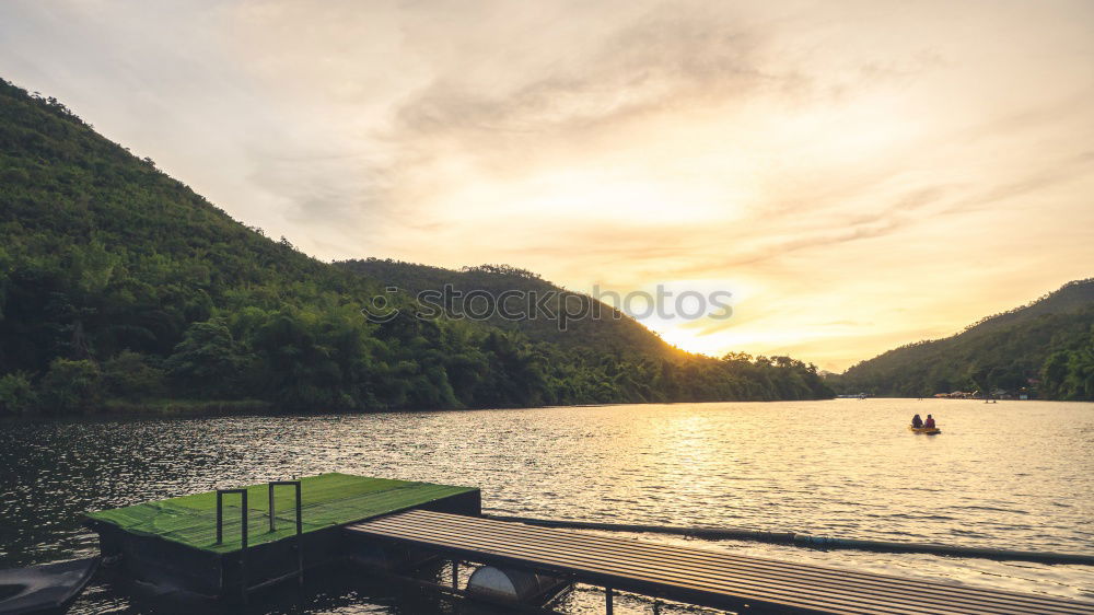 Similar – Image, Stock Photo Woman looking at hills on lake