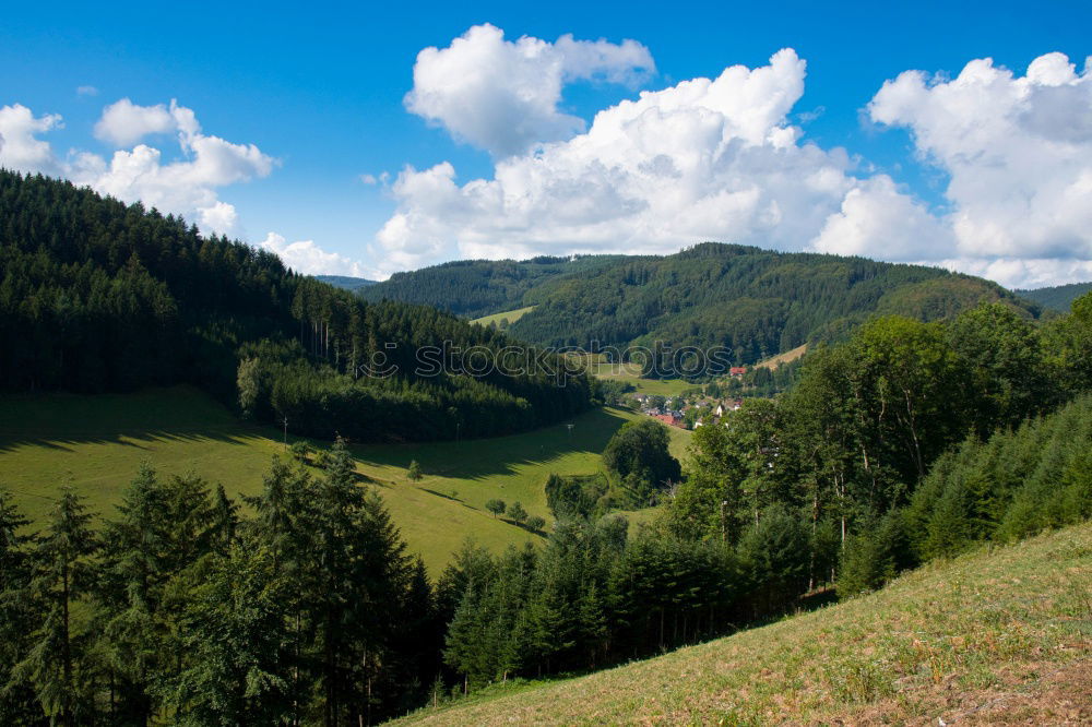 Similar – Green sunny valley in mountains and hills