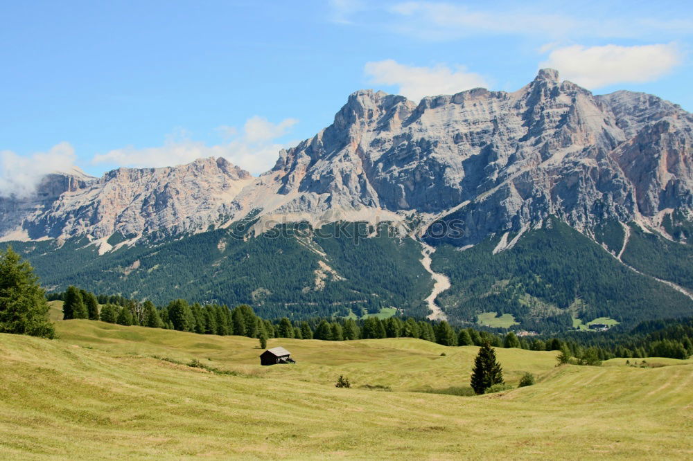 Similar – Hiking trail with hiker with panoramic view in the Dolomites