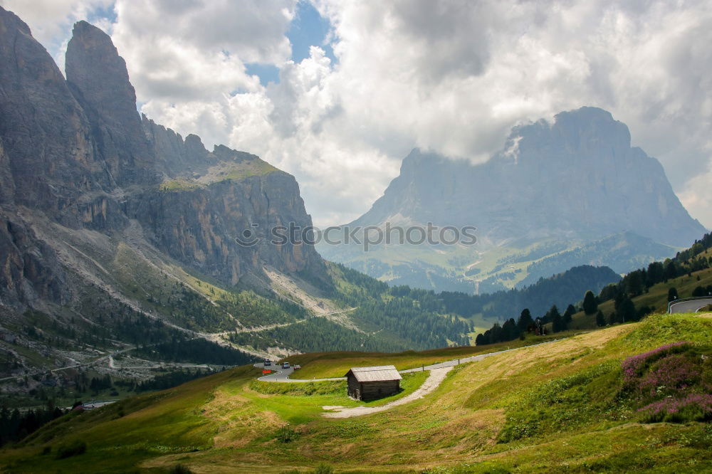 Similar – Hiking trail with hiker with panoramic view in the Dolomites