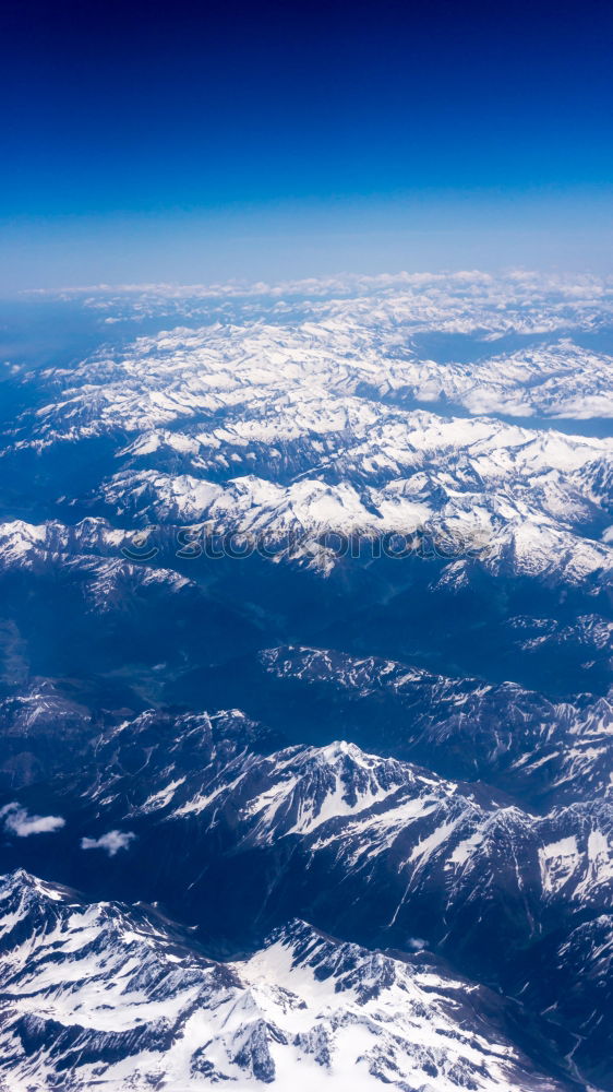 Similar – Mountain range in snow